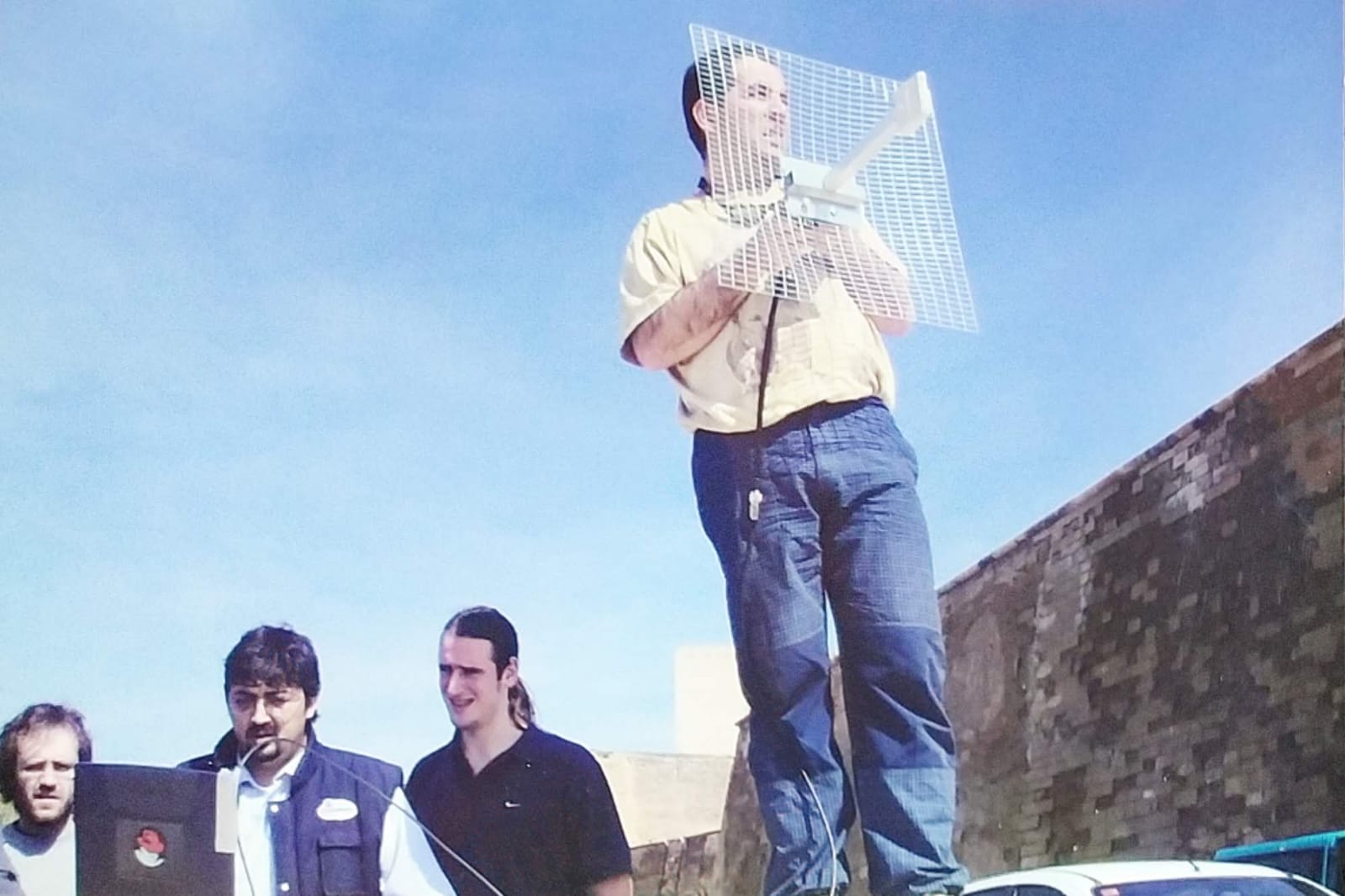 Team member holding a biquad antenna